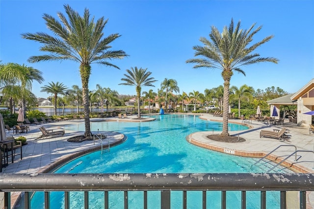 community pool featuring a patio area