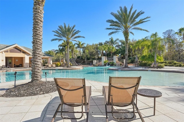 pool with a patio