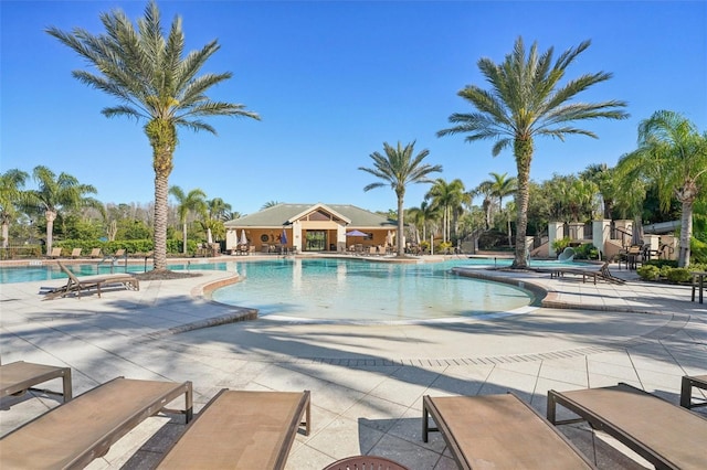 community pool featuring a patio area