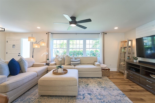 living room with recessed lighting, baseboards, wood finished floors, and ceiling fan