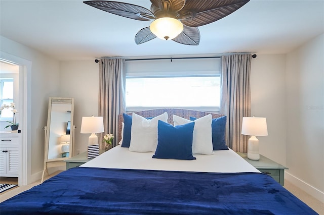 bedroom featuring baseboards, carpet, and a ceiling fan