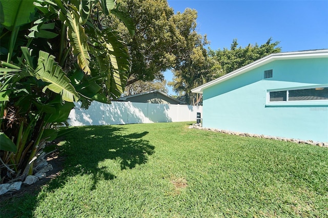 view of yard featuring fence