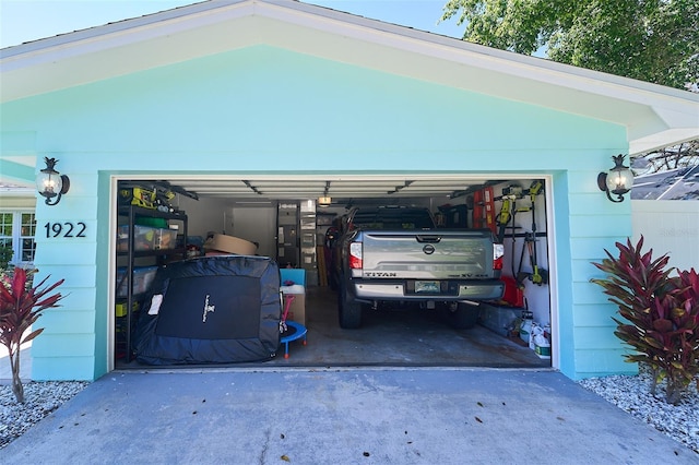 garage featuring driveway