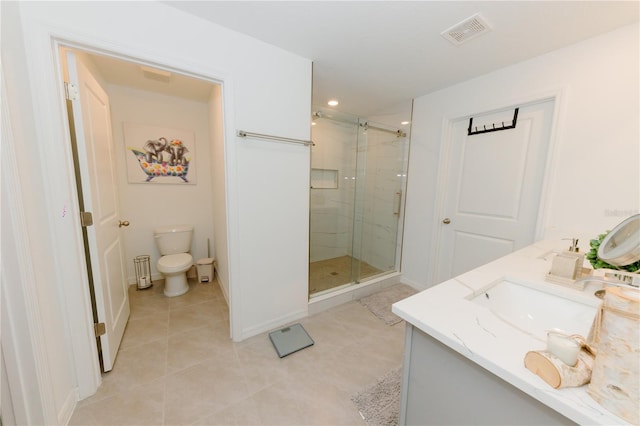 full bathroom with visible vents, toilet, a stall shower, a sink, and tile patterned flooring