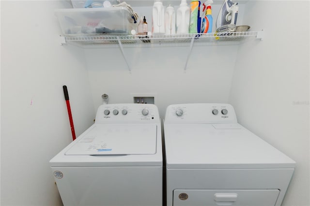 laundry room with laundry area and washing machine and dryer