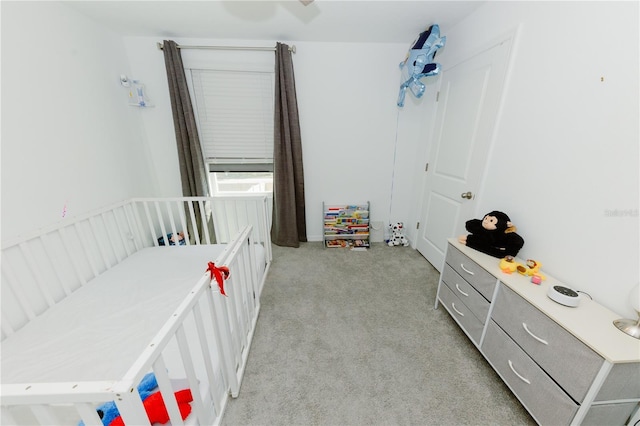 bedroom with light colored carpet