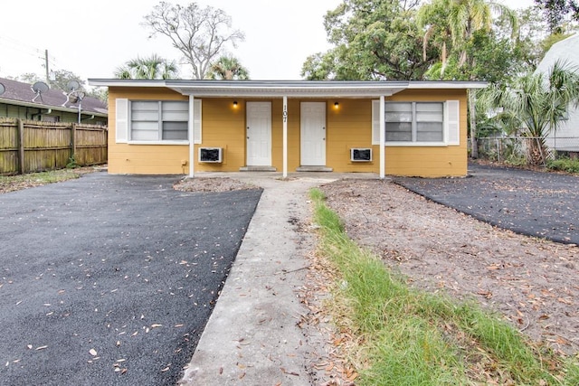 view of front of house with fence