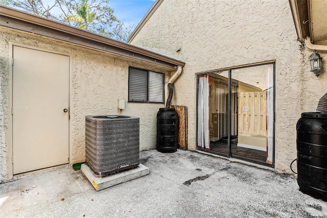 view of patio with central AC unit