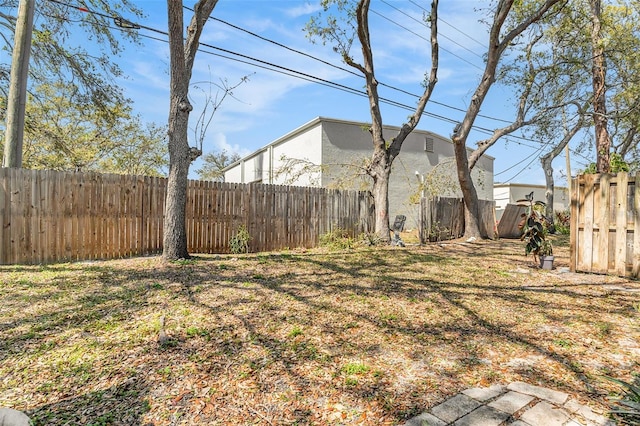 view of yard featuring a fenced backyard