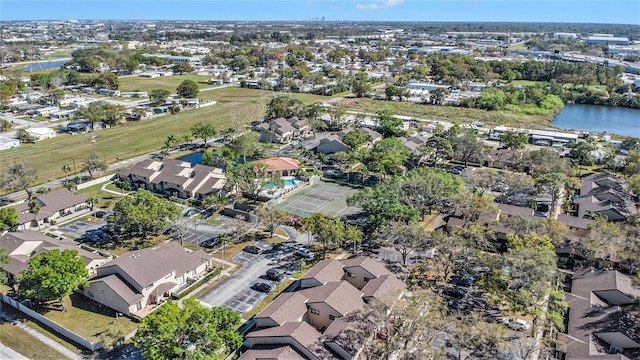 aerial view with a residential view and a water view