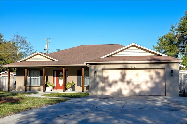 single story home with a porch, an attached garage, a shingled roof, stucco siding, and concrete driveway