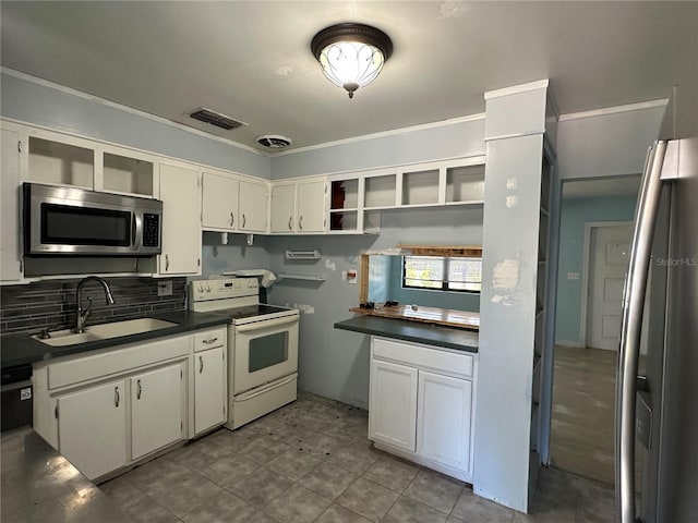 kitchen with stainless steel microwave, visible vents, a sink, electric stove, and open shelves