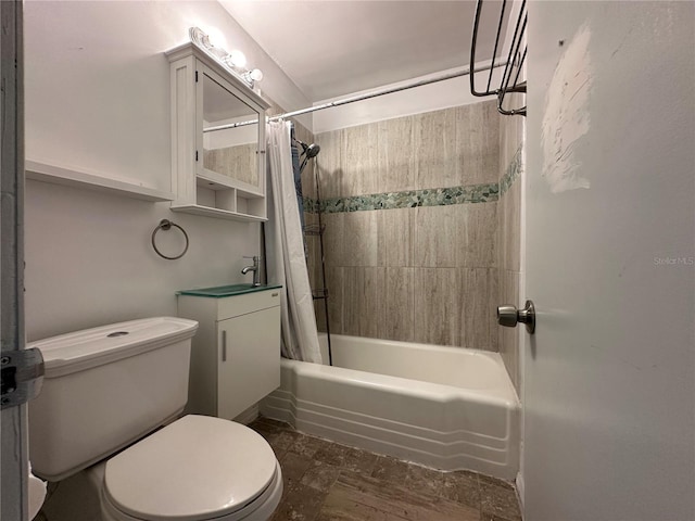 full bath featuring toilet, vanity, and shower / bath combo