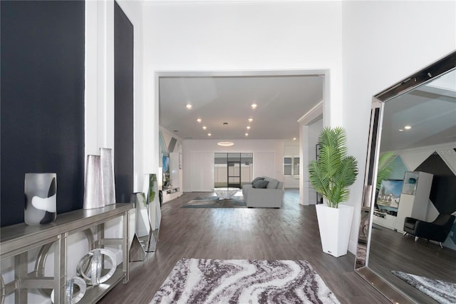 foyer featuring wood finished floors