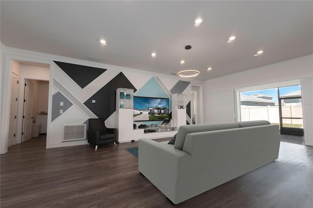 living room featuring visible vents, dark wood-type flooring, and crown molding