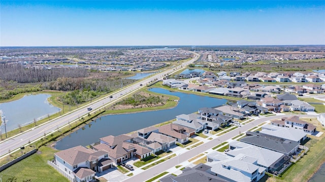 aerial view featuring a residential view and a water view