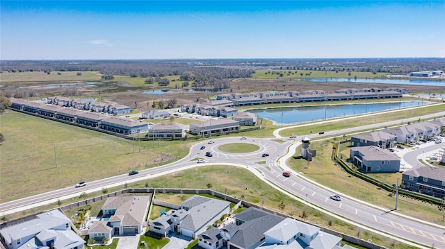 aerial view featuring a water view and a residential view