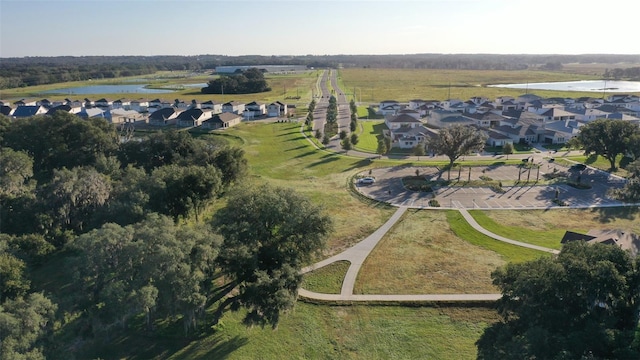 aerial view with a residential view and a water view