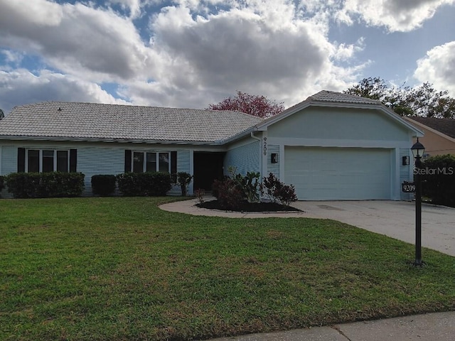 ranch-style home with a tiled roof, a front lawn, driveway, and a garage