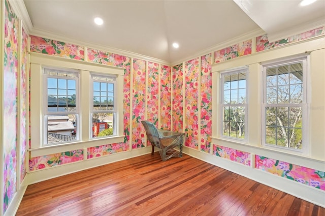 recreation room with wallpapered walls, plenty of natural light, and baseboards