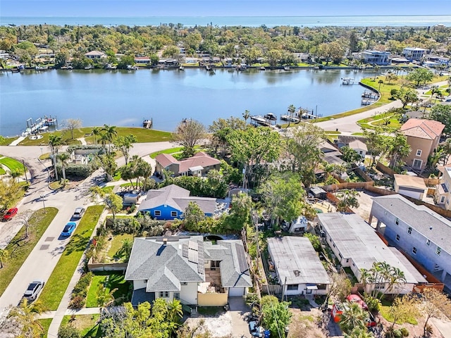 aerial view featuring a residential view and a water view