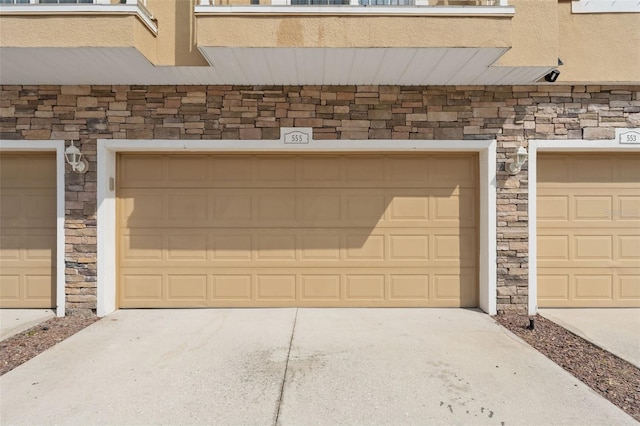 garage featuring driveway