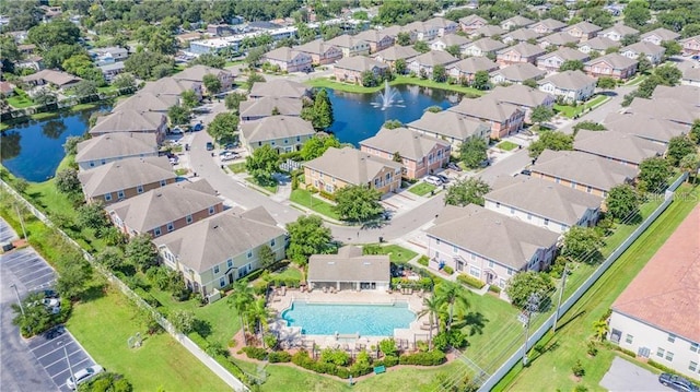 aerial view featuring a residential view and a water view