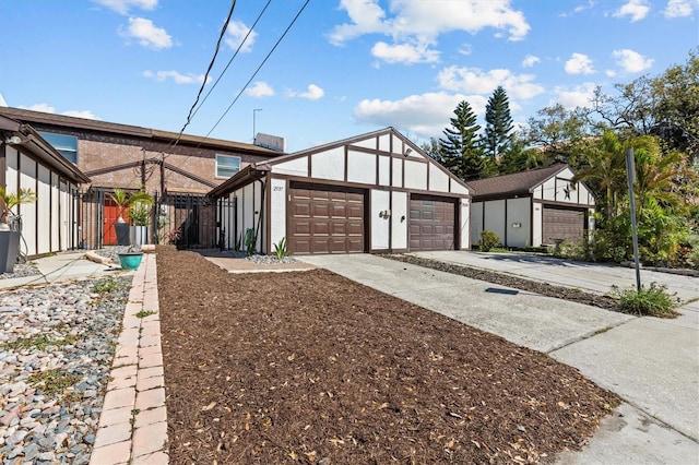 view of front of house with driveway and a garage