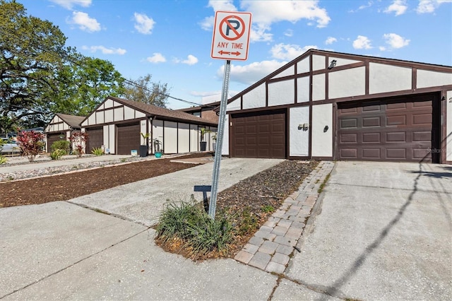 garage featuring driveway