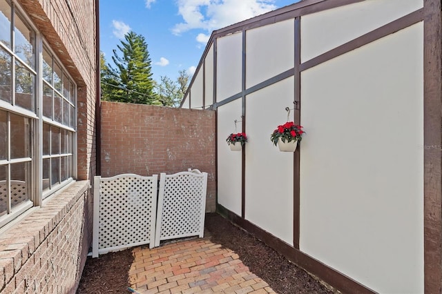 view of patio / terrace featuring fence