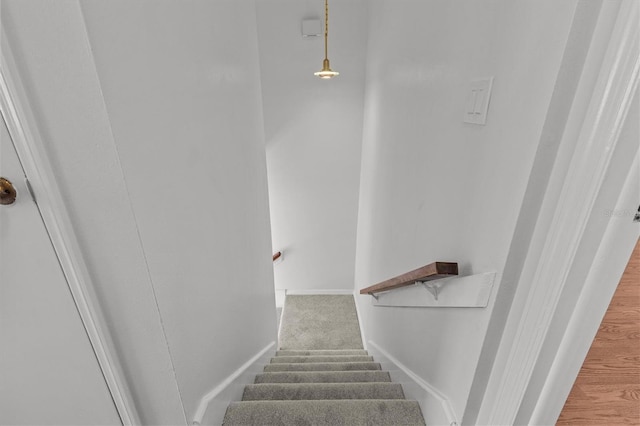 stairway with baseboards