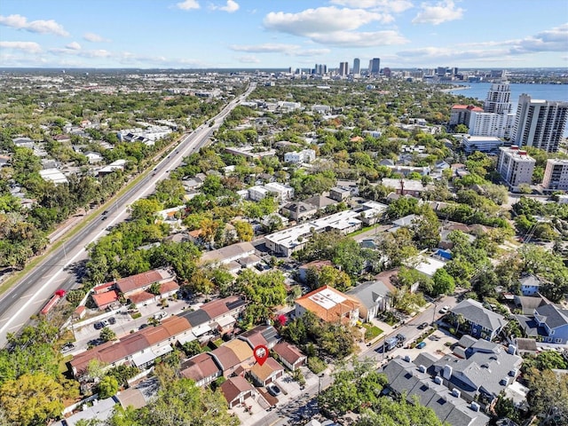 aerial view featuring a water view and a city view