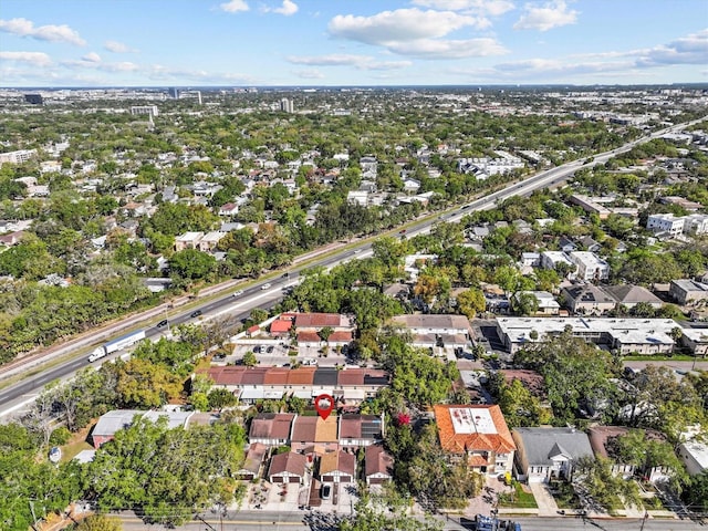 birds eye view of property with a residential view