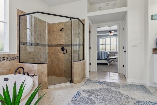 full bath featuring ceiling fan, a shower stall, tile patterned floors, a bath, and connected bathroom