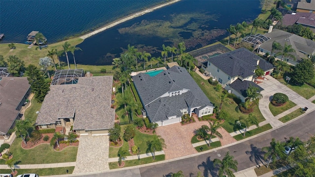 bird's eye view featuring a residential view and a water view