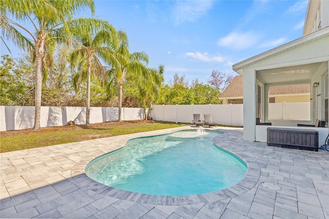 view of swimming pool with a patio, a fenced backyard, and a fenced in pool