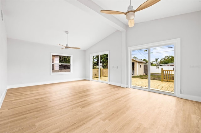 unfurnished living room with light wood-type flooring, baseboards, ceiling fan, and vaulted ceiling with beams