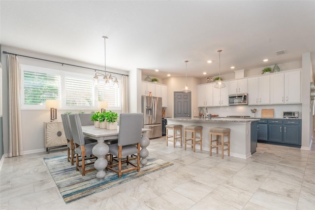 dining room featuring visible vents, recessed lighting, and baseboards