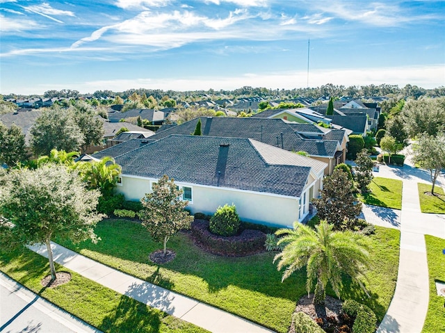 drone / aerial view with a residential view