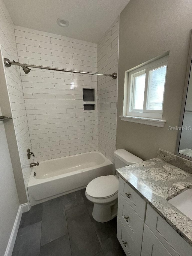 full bath featuring toilet, shower / washtub combination, and vanity