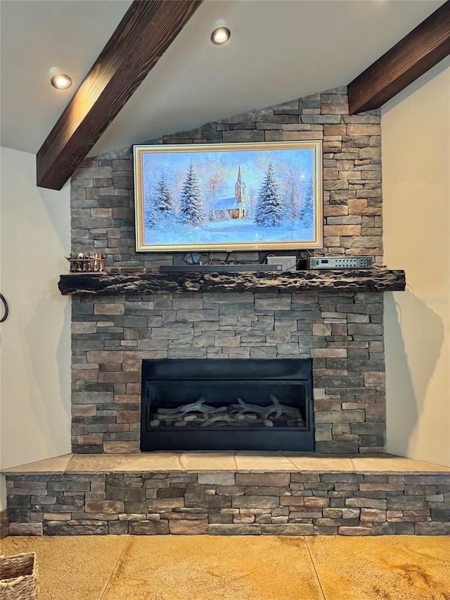 room details featuring recessed lighting, beamed ceiling, and a stone fireplace