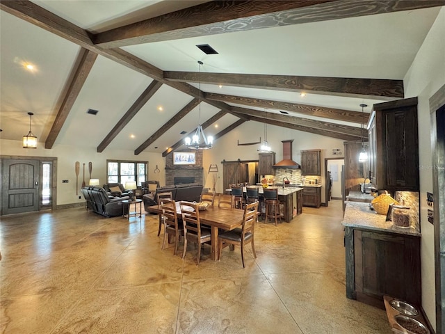 dining area with visible vents, beam ceiling, high vaulted ceiling, baseboards, and a chandelier