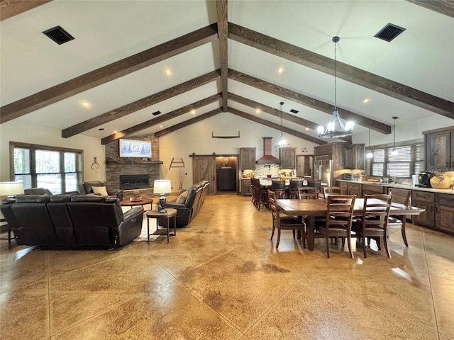 dining area with beam ceiling, visible vents, and high vaulted ceiling