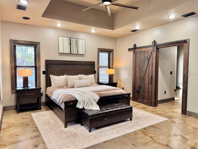 bedroom featuring visible vents, baseboards, a barn door, recessed lighting, and marble finish floor