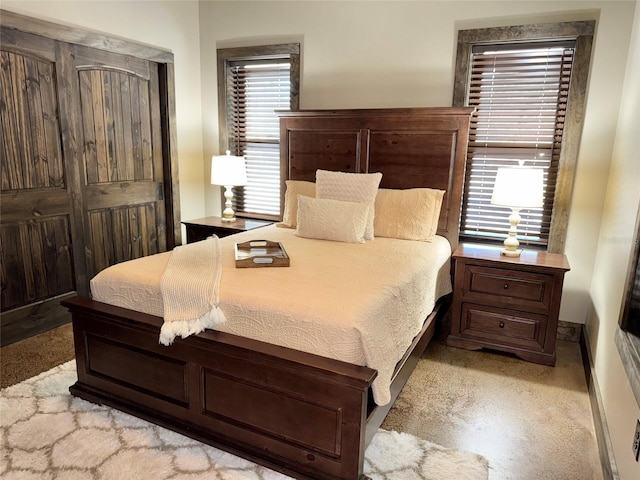 bedroom featuring baseboards