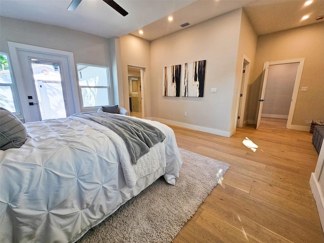 bedroom with recessed lighting, visible vents, baseboards, and light wood finished floors