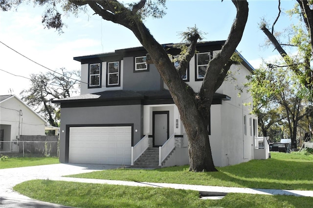 view of front of home featuring fence, an attached garage, stucco siding, a front lawn, and concrete driveway