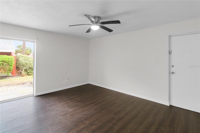 unfurnished room with a ceiling fan, baseboards, and wood finished floors