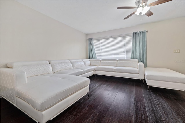 living area featuring ceiling fan and hardwood / wood-style floors