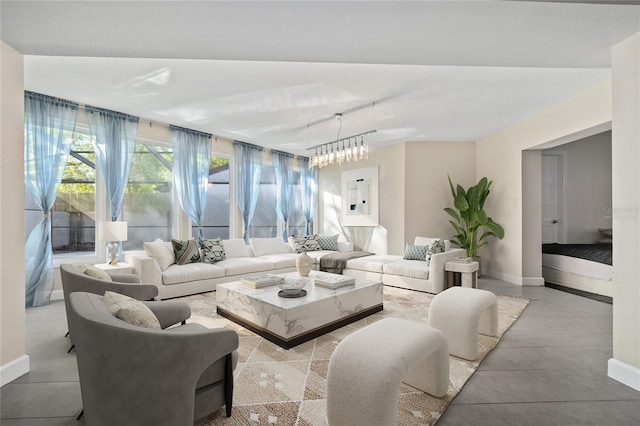 living area with tile patterned floors and baseboards